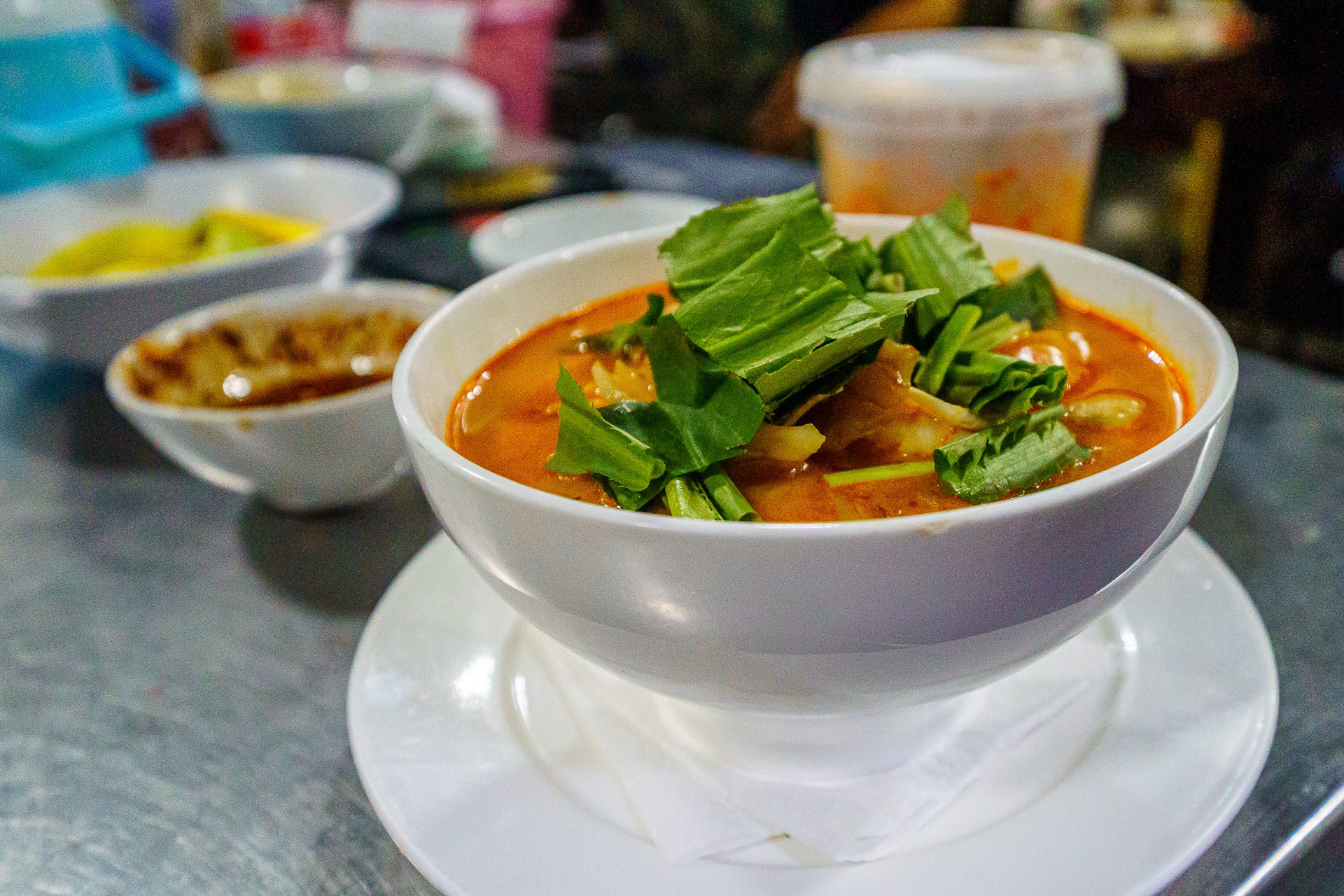 Bowl of Tom Yum Soup at The Game Bangkok. Photo by Food Foto Thailand.